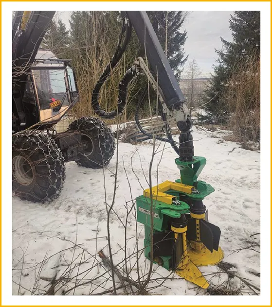 StemMaster mounted on a forwarder in a snowy young forest